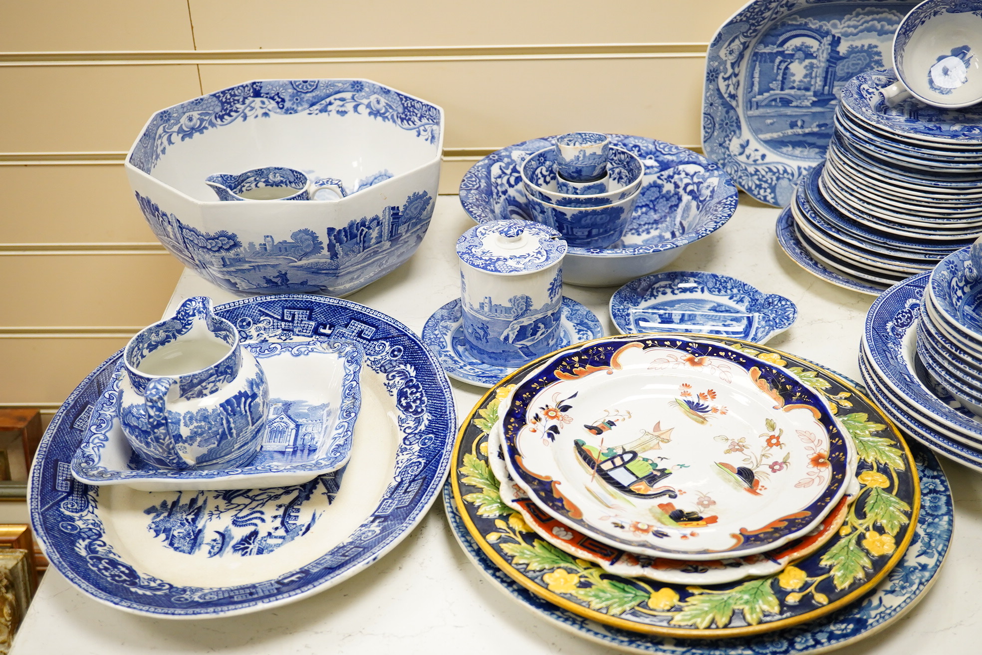 A quantity of blue and white china, mostly Spode Italian, together with a Davenport plate, a Mason's ironstone plate and a late Victorian majolica dish (a.f.). Condition - varies